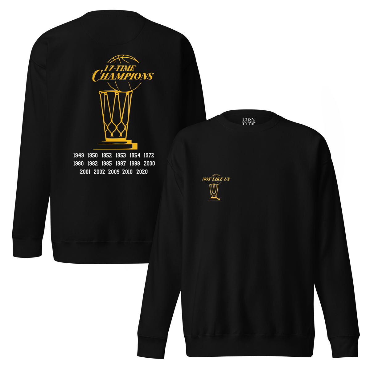 Back / Main Graphic View:Fleece crewneck sweatshirt featuring Lakers 17-time champions gold basketball trophy graphic and championship years on back   

Front View / Chest Detail:Close up front chest logo on Lakers 17-time champions Not Like Us basketball graphic crewneck sweatshirt